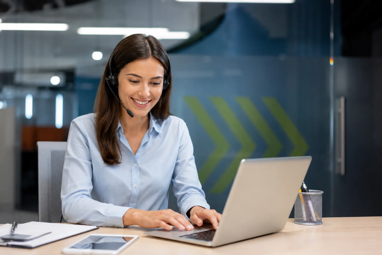 Self-employed professional comparing dental coverage information on a laptop.