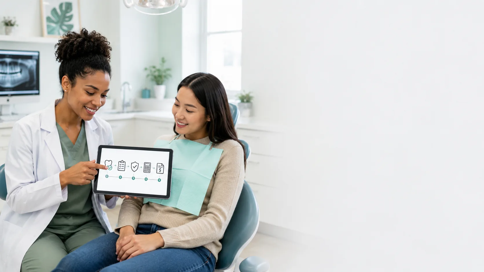 Dentist explaining the dental insurance claim process to a patient using a tablet in a modern dental office.